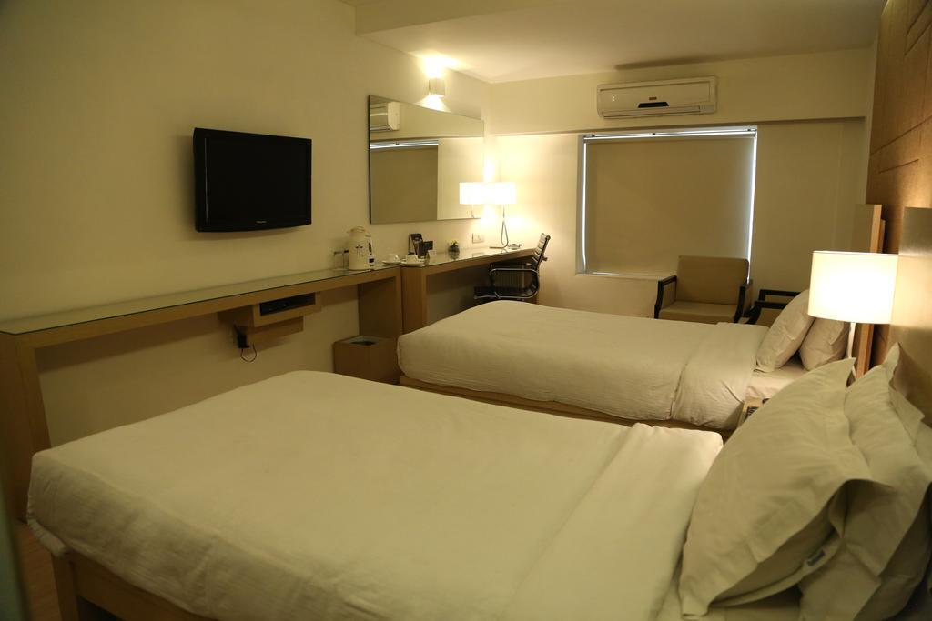 Hotel President Деградун Номер фото