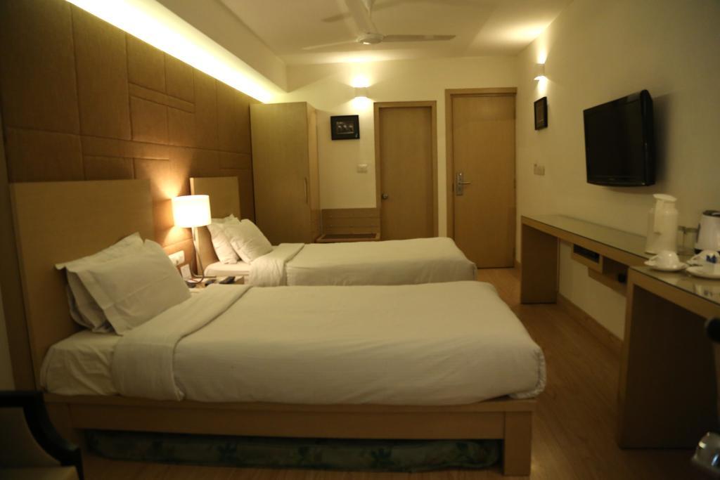 Hotel President Деградун Номер фото